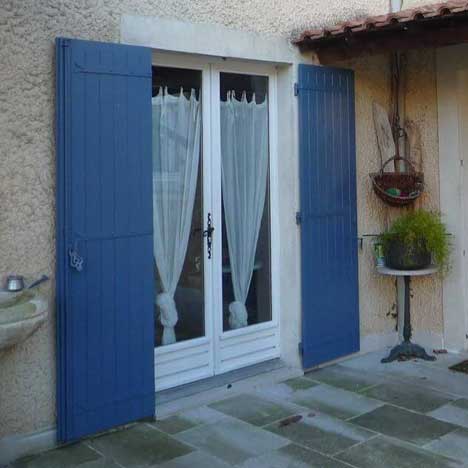 Porte-fenêtre en bois à 2 vantaux
